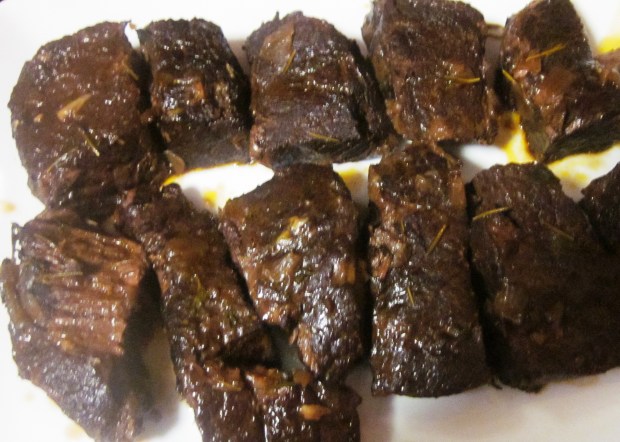 Serve ribs over mashed potatoes, and top with sauce.